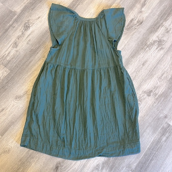 Boho Chic Olive Green Flutter Sleeve Babydoll Dress | 100% Cotton Tiered V-Neck - Picture 5 of 7